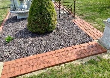 Memorial bricks outlining the scatter garden at Forever Home Cemetery